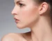 Woman with a sculpted, defined jawline after Kybella double chin treatment at Touch and Glow Med Spa in Glendale, AZ.